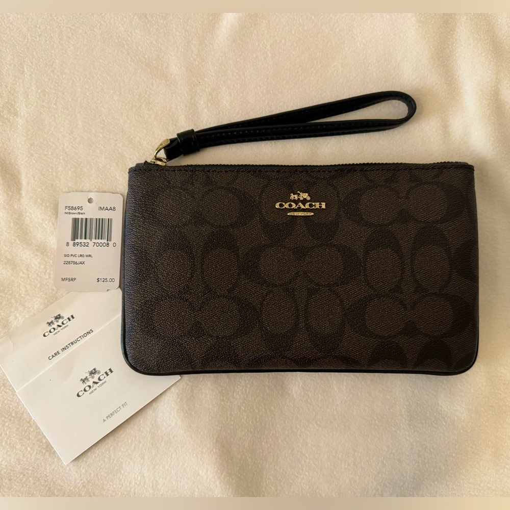 Coach Large Wristlet In Signature Canvas